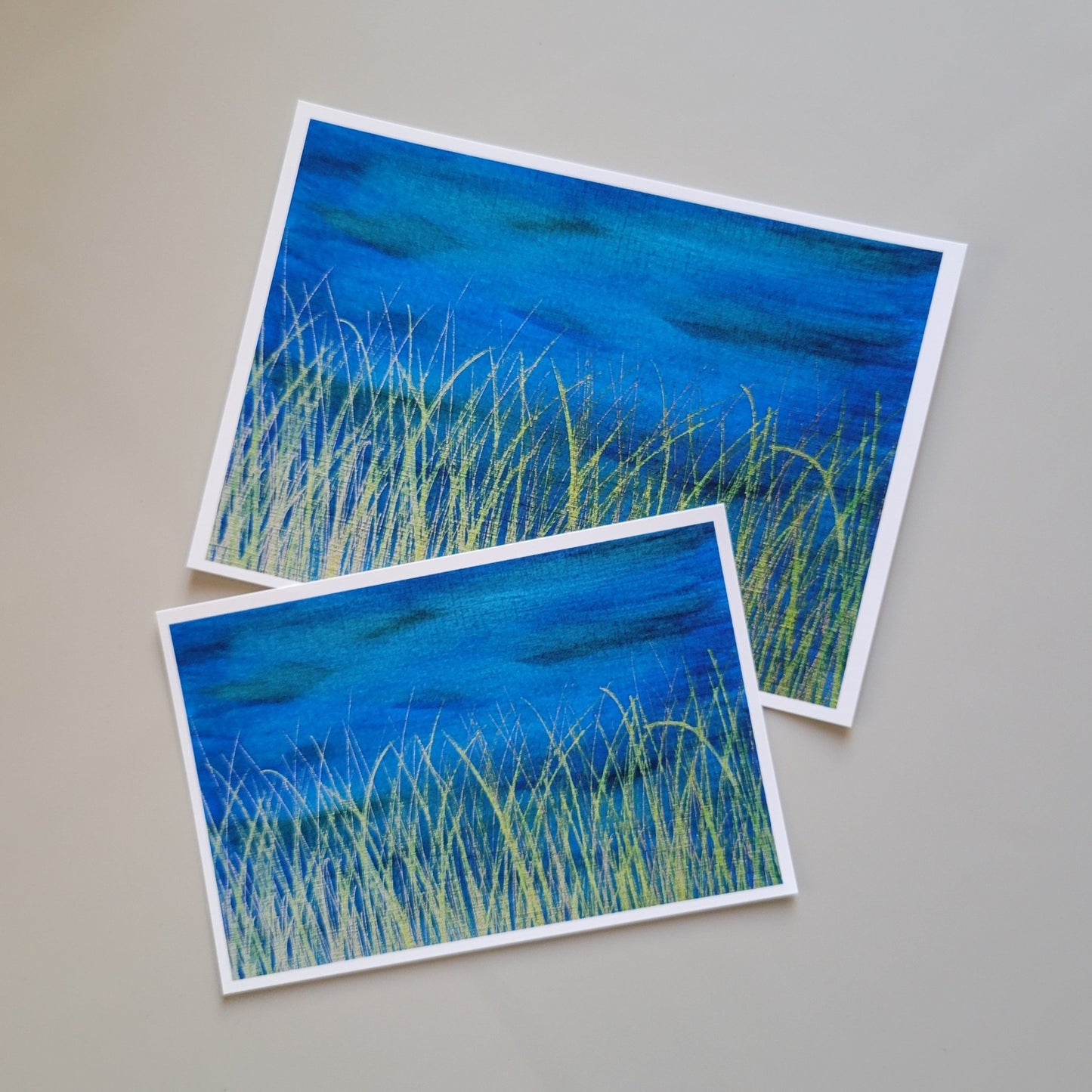 Botanical themed art print of a golden yellow grassy horizon against a deep blue background with hints of green. Image adapted from original painting. Delicate details set against a bold background, in a strong yet serene atmosphere. High quality print reproduction on specialty fine art printing paper.