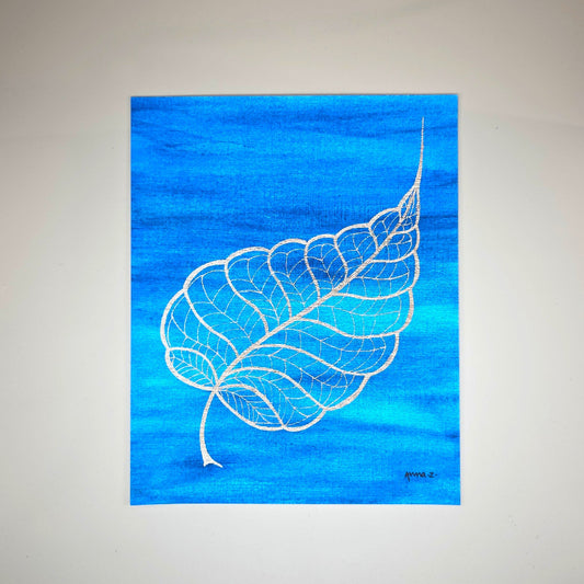Botanical themed art print of a graceful leaf with lace-like veins in golden yellow, set against a deep blue background with hints of green.