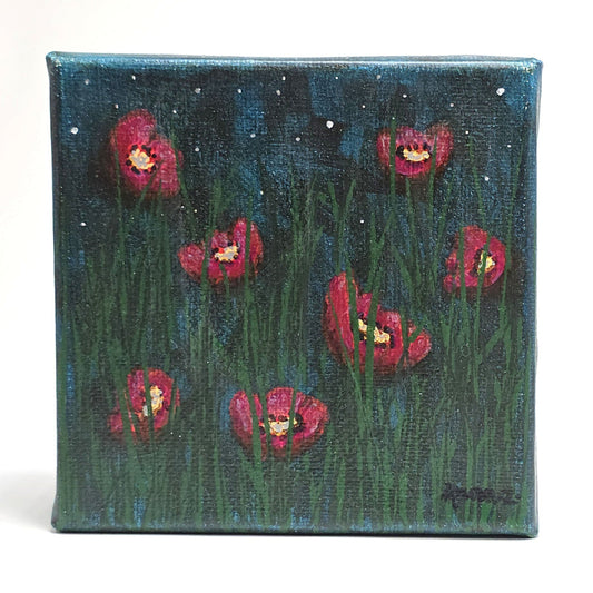 Front view of a dreamy mini painting of bright colored poppies take on a magenta hue in cool starlight. Grasses in foreground, and a starry sky with soft hazy clouds in the background. 