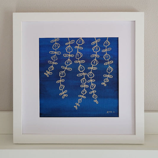 Golden leafy tendrils hanging in the breeze, with some veining detail on the oval leaves. In metallic ink set against a deep blue watercolor background with hints of green, this color combination creates a perfect balance of richness and minimalism. This piece has exactly 100 leaves, either fully or partially visible.