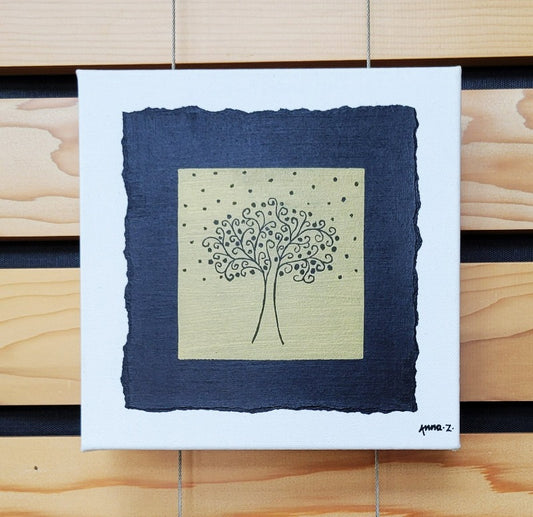 Intricate metallic block print of a fruit laden tree with swirling branches reaching for the stars, embossed on a black background. Deep gold colored embossing on black cardstock and white canvas.