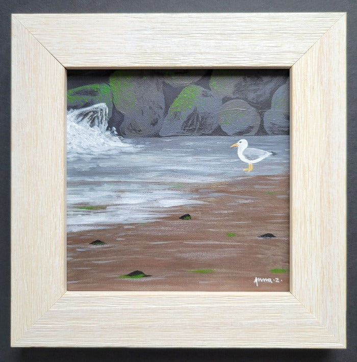 Original painting by Annazach Art. This miniature painting is based on a scene from a rocky beach on the Olympic Peninsula. A little seagull gazes contemplatively at the soft waves on a rocky beach at La Push.