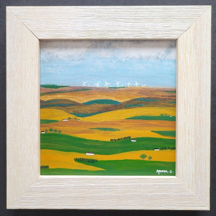 Original painting by Annazach Art. Miniature landscape painting of wind turbines spinning beyond the rolling hills in the horizon